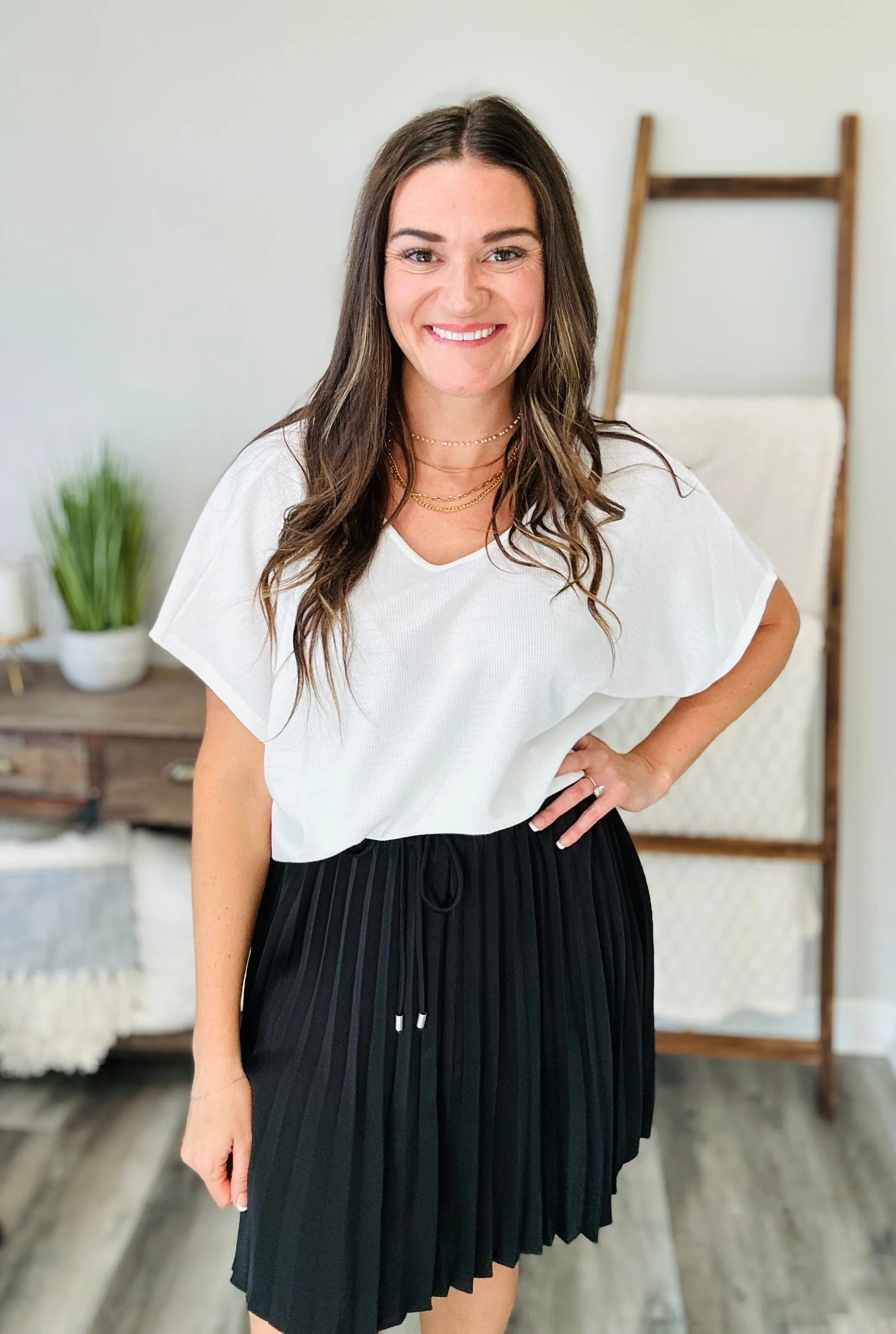Just a Flirt Pleated Skirt in Black