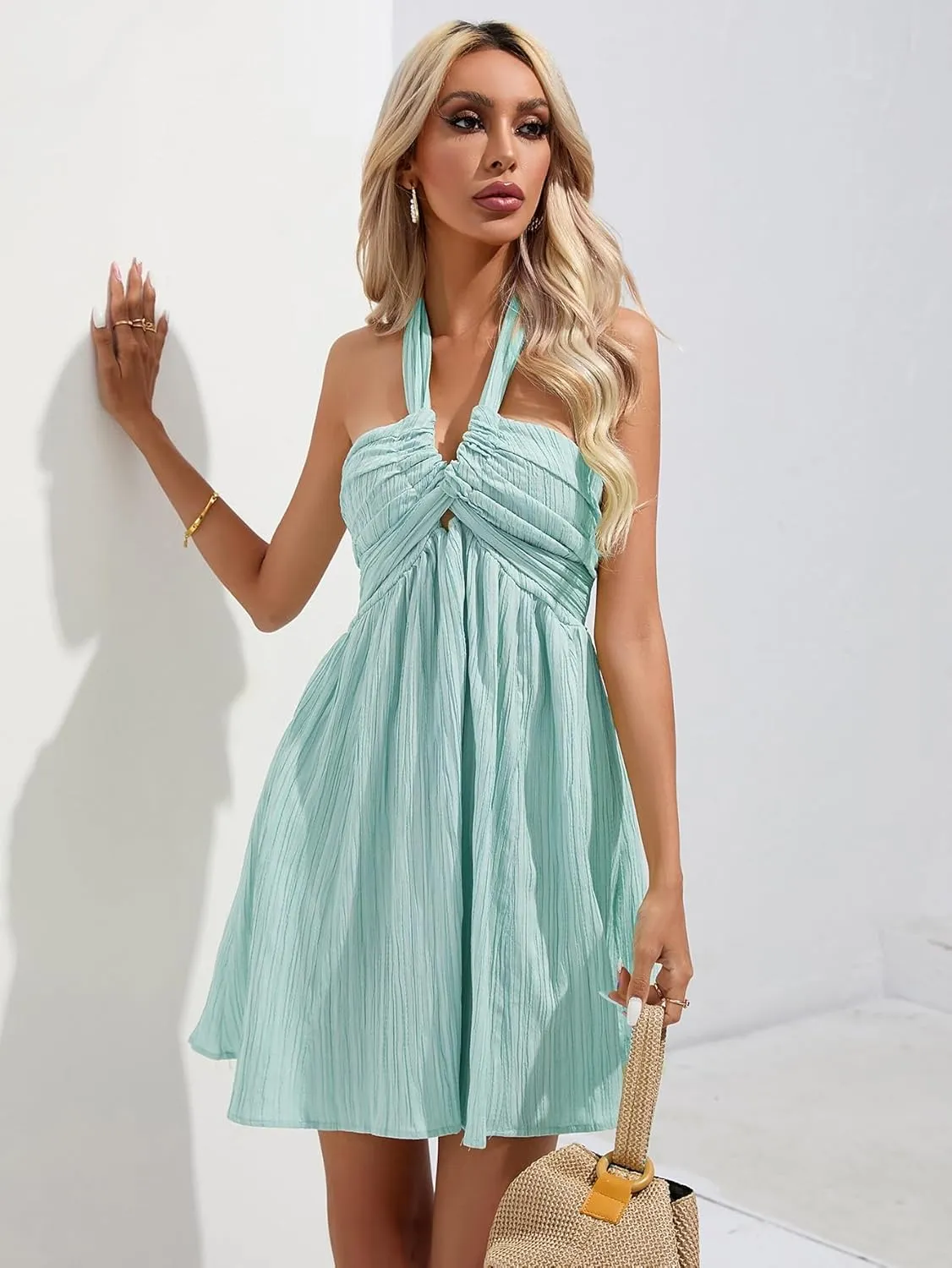 WDIRARA Women's Halter Tie Backless Smocked A Line Flowy Summer Vacation Mini Dress